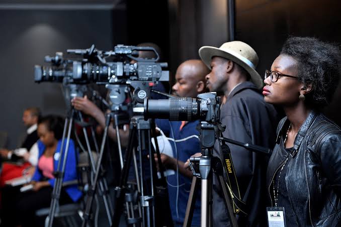Kenyan business professionals discussing PR strategy